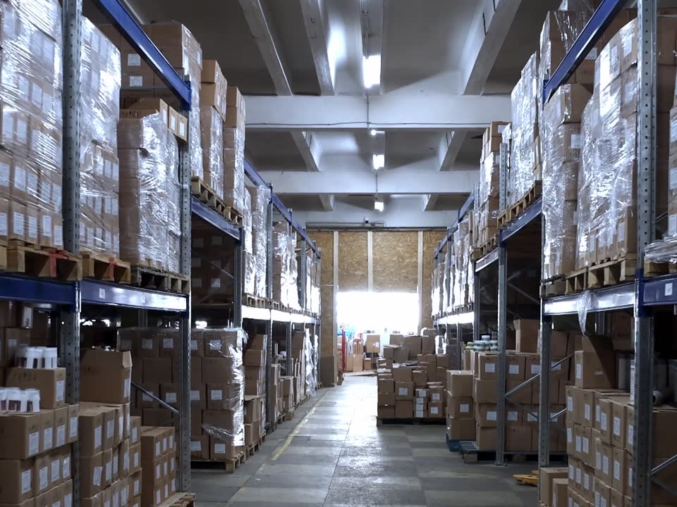 Warehouse racks with boxed products